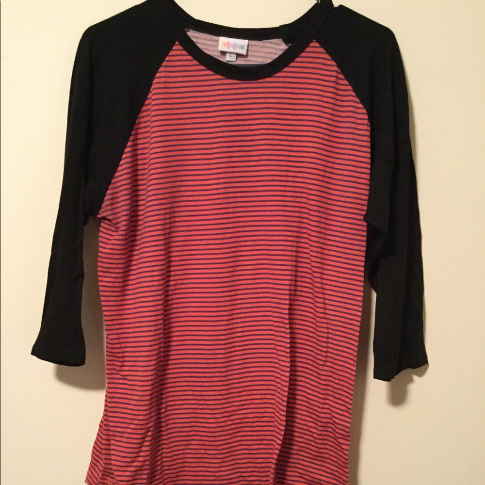 LuLaRoe tee. 2 tops for $7.00.